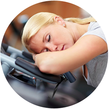 A lady feeling fatigued during the workout